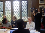 Meadow filming Security Council with Rolanda looking on.jpg